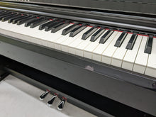 Load image into Gallery viewer, Yamaha Clavinova CLP-525PE digital piano in glossy black ebony stock # 22427