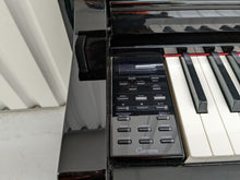 Load image into Gallery viewer, Yamaha Clavinova CLP-545PE in Polished Ebony glossy black. stock nr 22425
