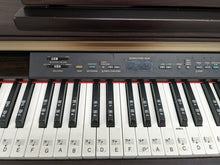 Load image into Gallery viewer, Yamaha Clavinova CLP-130 Digital Piano and stool in rosewood stock number 22450