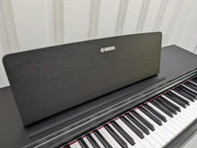 Load image into Gallery viewer, Yamaha Arius YDP-143 Digital Piano and stool in satin black stock number 22458