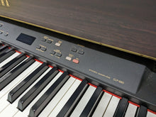 Load image into Gallery viewer, YAMAHA CLAVINOVA CLP-880 high end Digital Piano in rosewood Stock nr 23011