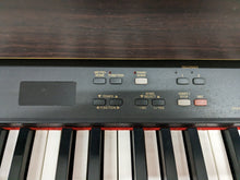 Load image into Gallery viewer, YAMAHA CLAVINOVA CLP-880 high end Digital Piano in rosewood Stock nr 23011