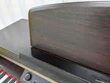 Load image into Gallery viewer, Yamaha Clavinova CLP-150 Digital Piano in dark rosewood colour stock nr 23032