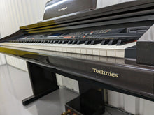 Load image into Gallery viewer, Technics SX-PR900M digital piano ensemble in glossy polished dark rosewood stock 23027