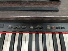 Load image into Gallery viewer, Yamaha Arius YDP-121 Digital Piano in dark rosewood stock nr 23028