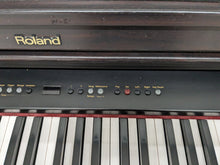 Load image into Gallery viewer, Roland HP103e full size Digital Piano in dark rosewood finish stock nr 23034