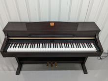 Load image into Gallery viewer, Yamaha Clavinova CLP-330 Digital Piano with matching stool in rosewood colour stock nr 23047