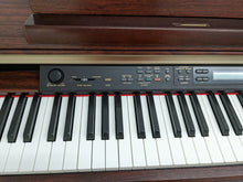 Load image into Gallery viewer, Yamaha Clavinova CLP-150 Digital Piano with stool in mahogany stock nr 23054