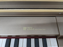 Load image into Gallery viewer, Roland HP237Le Digital Piano in light oak finish Stock nr 23069