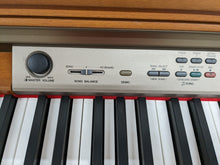 Load image into Gallery viewer, Yamaha Clavinova CLP-150 Digital Piano with stool in cherry wood stock nr 23072