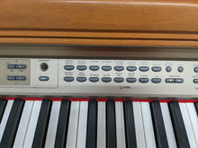 Load image into Gallery viewer, Yamaha Clavinova CLP-150 Digital Piano with stool in cherry wood stock nr 23072