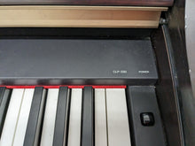 Load image into Gallery viewer, Yamaha Clavinova CLP-330 Digital Piano in dark rosewood finish stock nr 23067