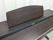 Load image into Gallery viewer, Roland HP101e Digital Piano in rosewood weighted keys 3 pedals, stock # 23082