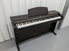 Load image into Gallery viewer, Roland HP101e Digital Piano in rosewood weighted keys 3 pedals, stock # 23082