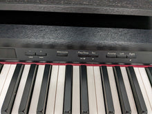 Load image into Gallery viewer, Roland DP990F digital slim line space saving piano in satin black stock # 23060