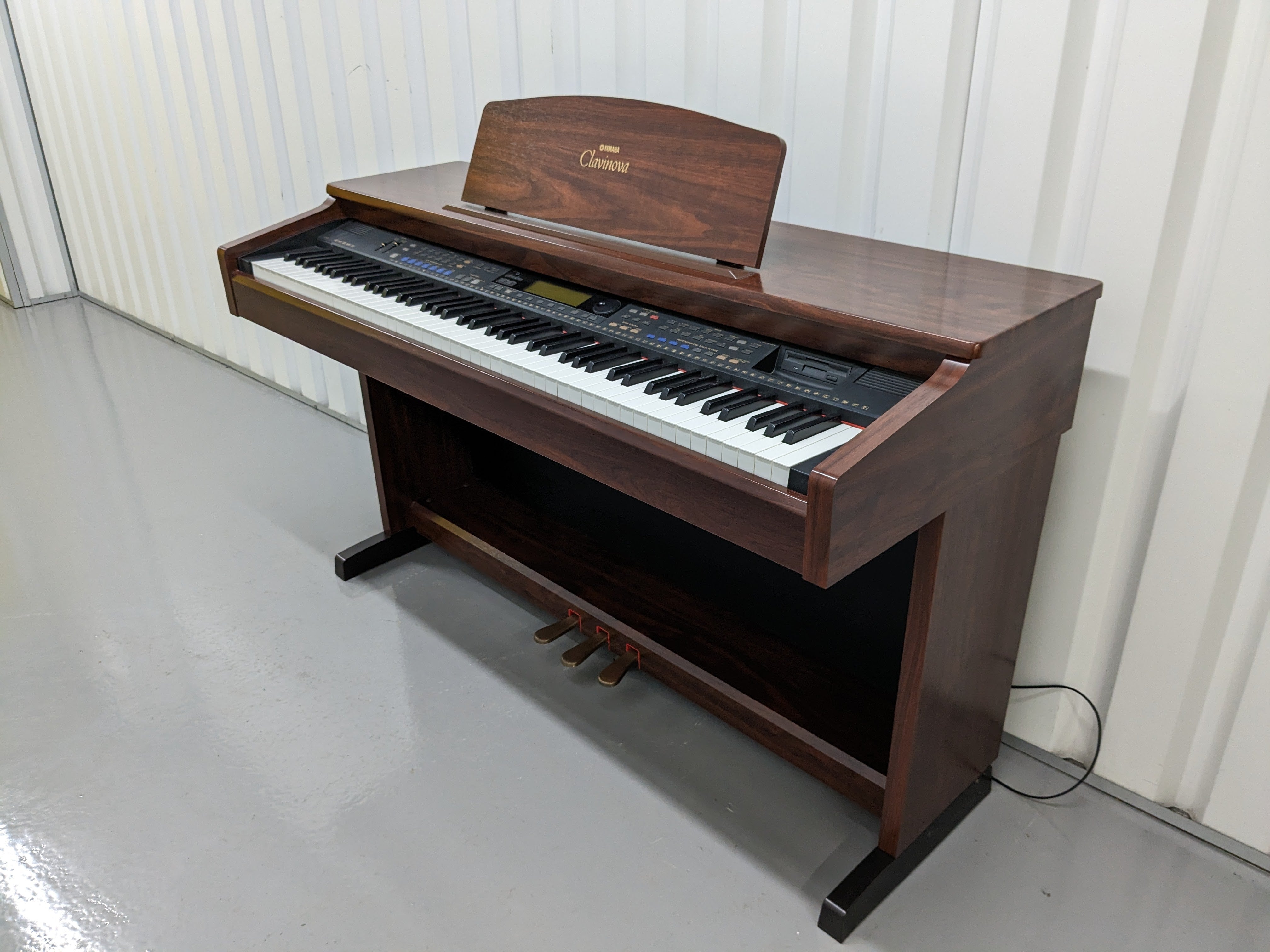 Yamaha Clavinova CVP-103 Digital Piano and stool in mahogany stock nr –  Sulinda Music