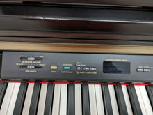 Load image into Gallery viewer, Yamaha Clavinova CLP-130 Digital Piano in rosewood stock number 23092