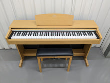 Load image into Gallery viewer, Yamaha Arius YDP-140 digital piano and stool in light oak / cherry wood finish stock number 23106