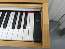Load image into Gallery viewer, Yamaha Arius YDP-140 digital piano and stool in light oak / cherry wood finish stock number 23106