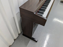 Load image into Gallery viewer, Yamaha Arius YDP-140 Digital Piano in rosewood finish stock number 23140