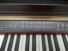 Load image into Gallery viewer, Yamaha Clavinova CLP-130 Digital Piano and stool in rosewood stock number 23155