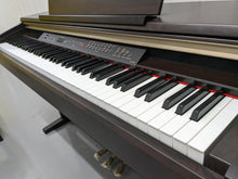 Load image into Gallery viewer, Yamaha Clavinova CLP-130 Digital Piano and stool in rosewood stock number 23155