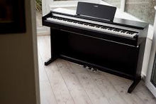 Load image into Gallery viewer, Yamaha Arius YDP-142 Digital Piano in satin black. Stock number 22263