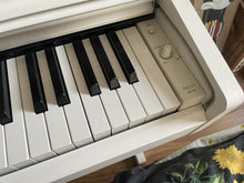 Load image into Gallery viewer, Yamaha Arius YDP-144 digital piano in white, weighted keys, stock nr 22384