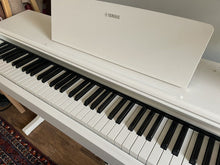 Load image into Gallery viewer, Yamaha Arius YDP-144 digital piano in white, weighted keys, stock nr 22384