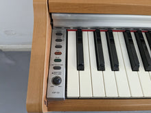 Load image into Gallery viewer, Yamaha Arius YDP-131 Digital Piano in cherry / light oak  finish stock nr 23162
