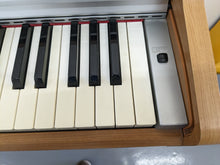 Load image into Gallery viewer, Yamaha Arius YDP-131 Digital Piano in cherry / light oak  finish stock nr 23162
