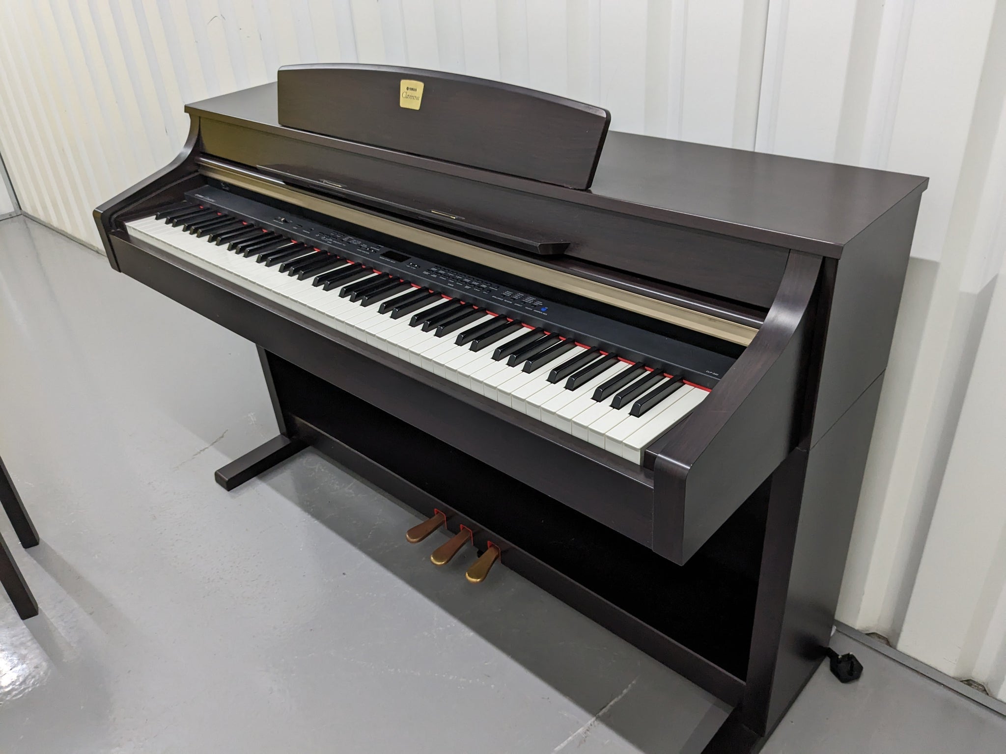 Yamaha Clavinova CLP-340 Digital Piano and stool in rosewood stock