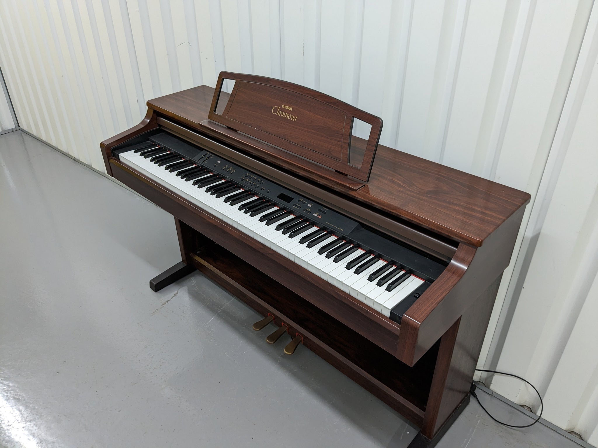 Yamaha Clavinova CLP-860 Digital Piano in mahogany finish stock # 2317 –  Sulinda Music