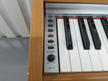 Load image into Gallery viewer, Yamaha Arius YDP-131 Digital Piano and stool cherry wood finish stock nr 23187
