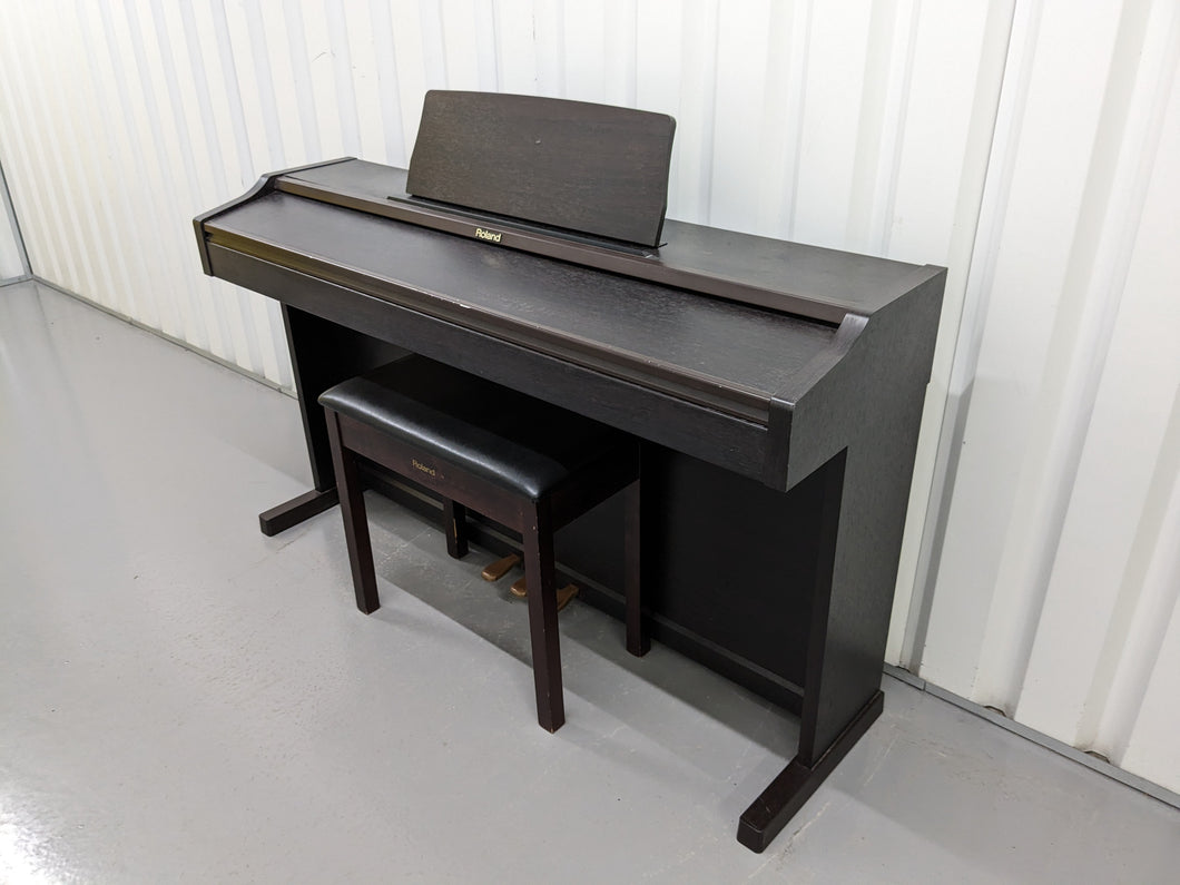 Roland RP101 Digital Piano and matching stool in rosewood Stock # 23192