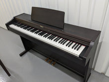 Load image into Gallery viewer, Roland RP101 Digital Piano and matching stool in rosewood Stock # 23192
