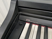 Load image into Gallery viewer, Roland RP201 Digital Piano in satin black finish Stock # 23230
