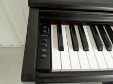 Load image into Gallery viewer, Yamaha Arius YDP-144 digital piano and stool in dark rosewood stock nr 23240
