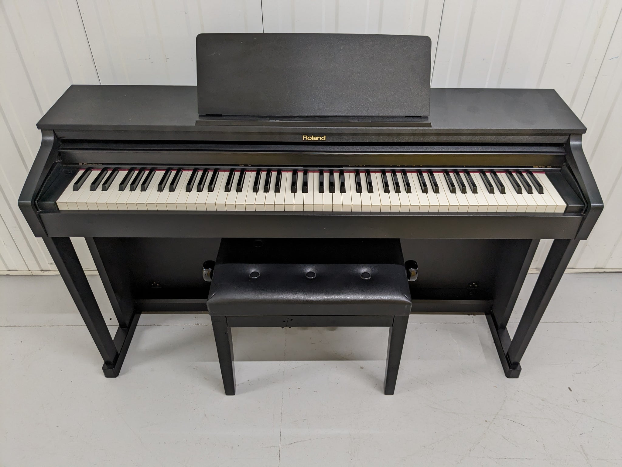 Roland HP503 digital piano and stool in satin black finish stock numbe –  Sulinda Music