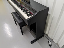 Load image into Gallery viewer, Roland RP401R digital piano and stool in satin black finish stock number 23265
