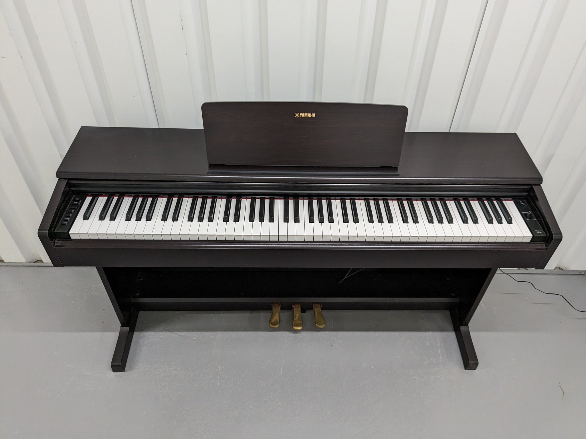 Yamaha Arius YDP-144 digital piano in dark rosewood finish stock