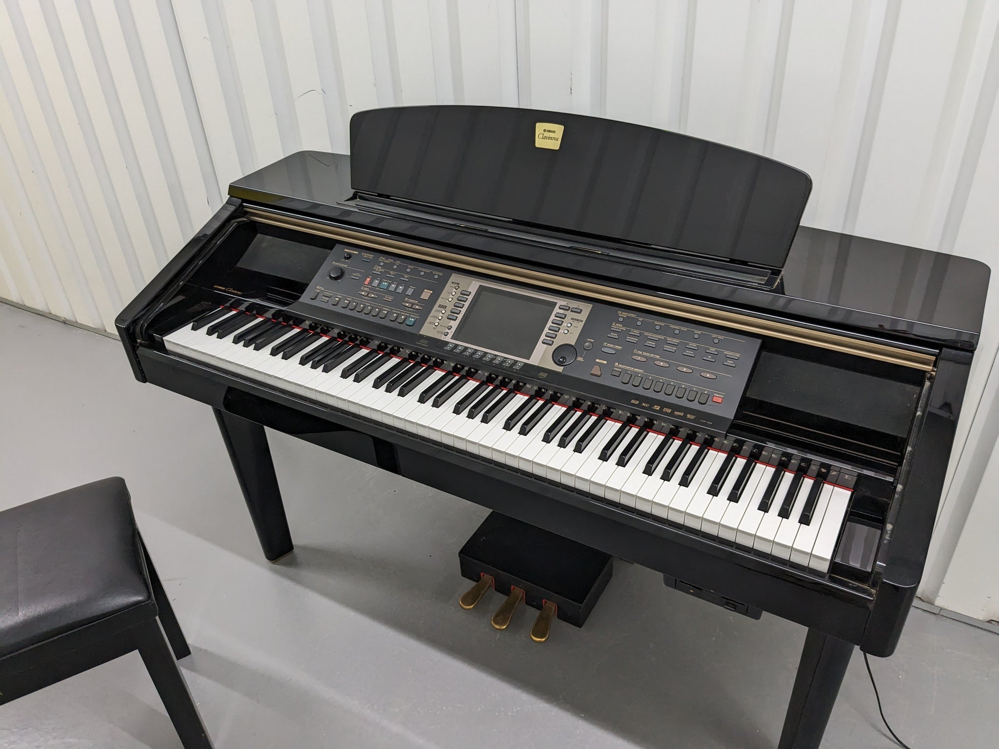 Yamaha Clavinova CVP-209 in Polished Ebony with matching stool. stock –  Sulinda Music