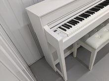 Load image into Gallery viewer, Yamaha Clavinova CLP-545 digital piano in satin white with stool. stock nr 23369

