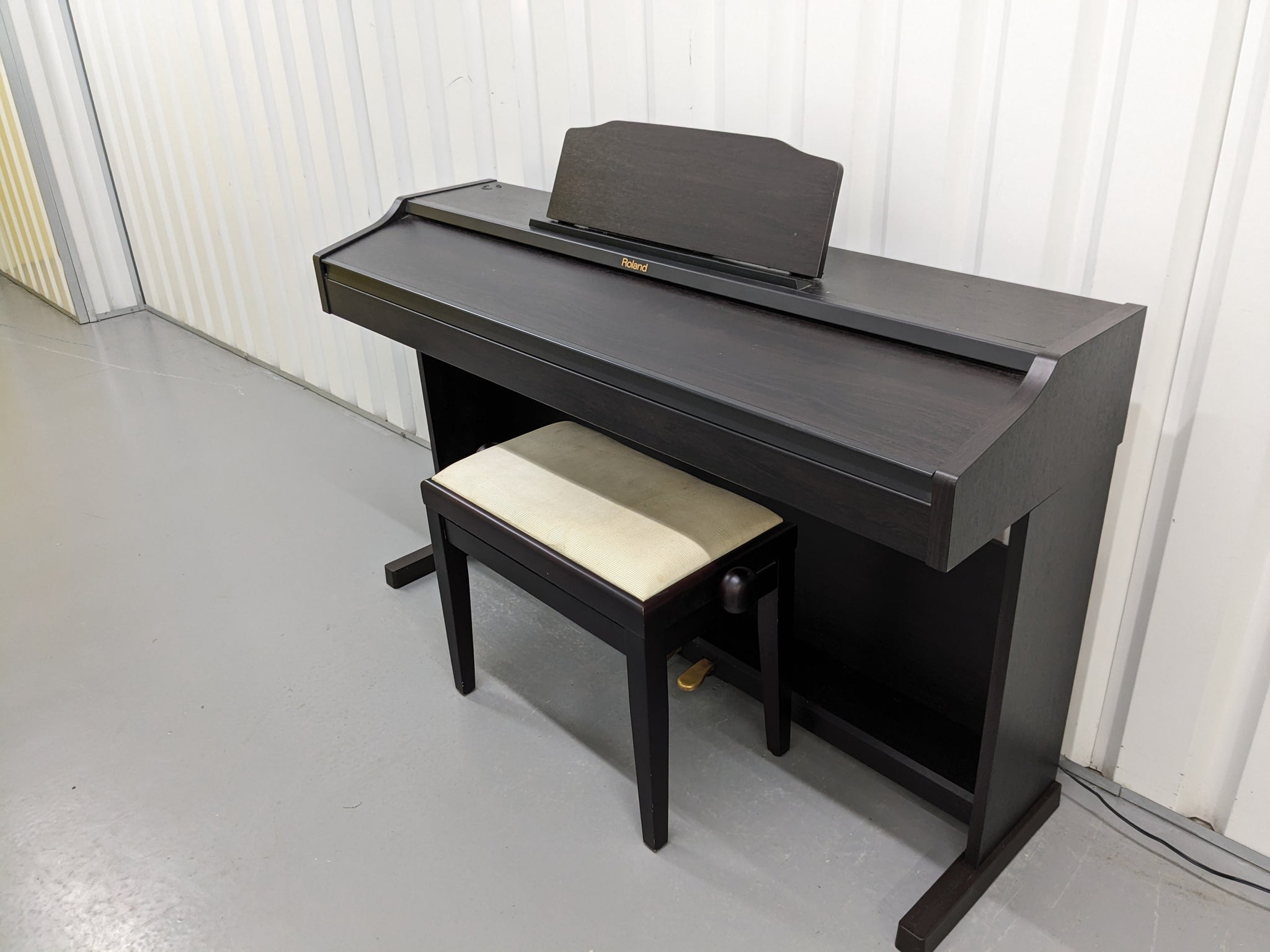 Roland RP401R digital piano and stool in dar rosewood finish stock num –  Sulinda Music