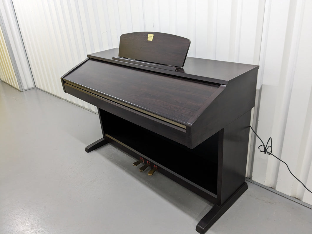 Yamaha Clavinova CVP-301 Digital Piano / arranger in rosewood. stock # 23444