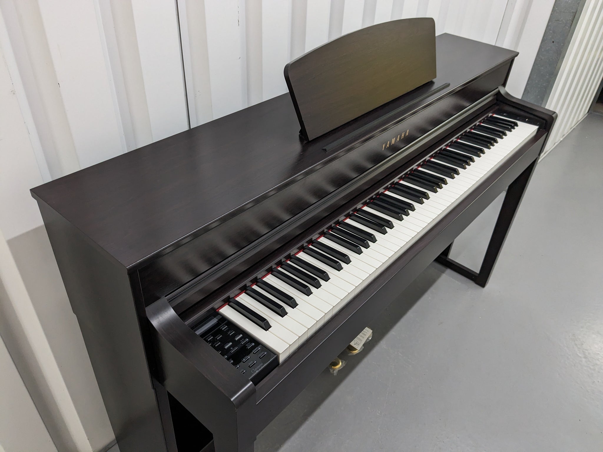 Yamaha Clavinova CLP-535 digital piano and stool in dark