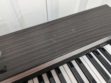 Load image into Gallery viewer, Casio Privia PX-720 Slim Digital Piano slim in rosewood stock number 23467
