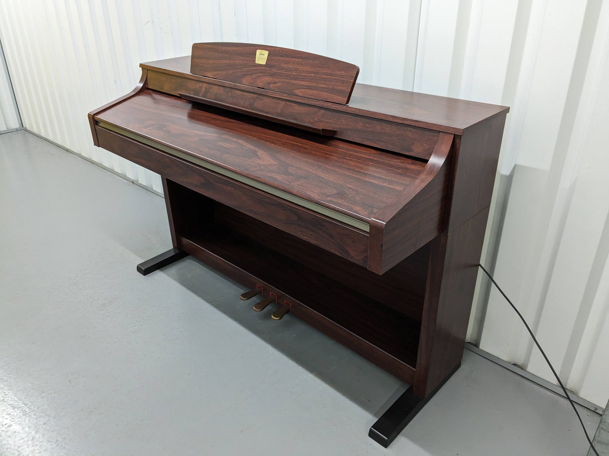 Yamaha Clavinova CLP-330 digital piano in mahogany finish stock number –  Sulinda Music