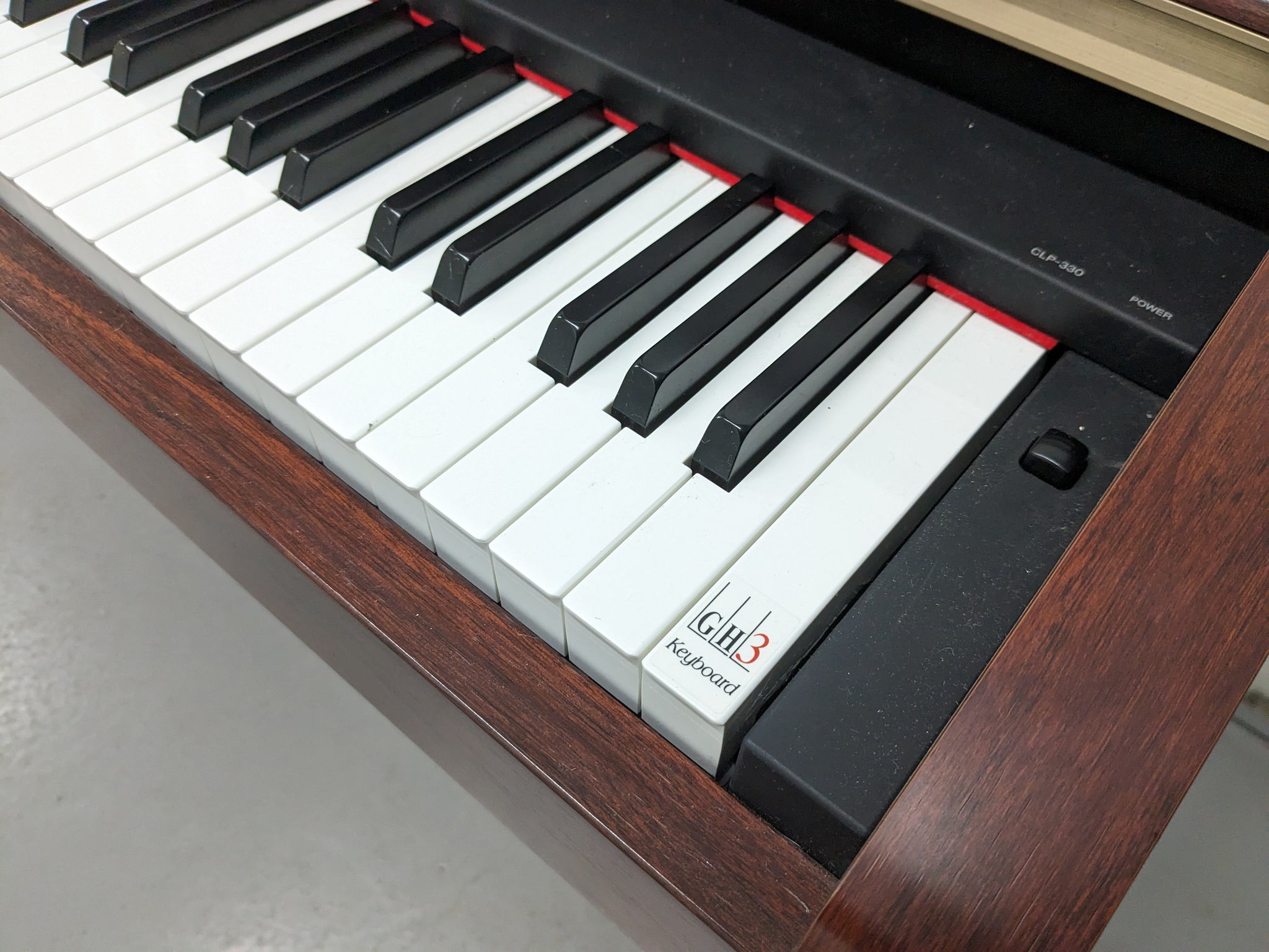 Yamaha Clavinova CLP-330 digital piano in mahogany finish stock