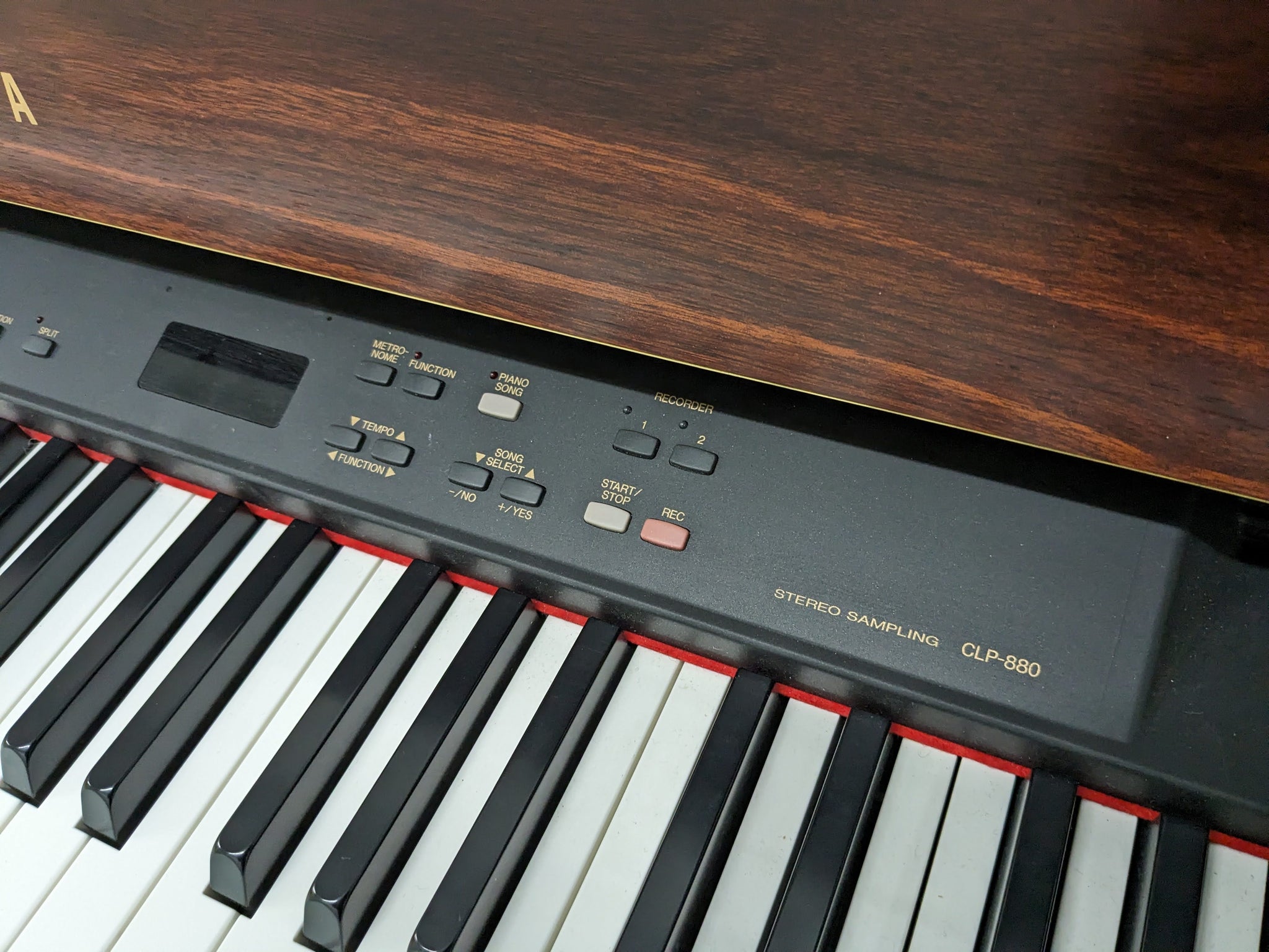 Yamaha Clavinova CLP-880 digital piano and stool in mahogany